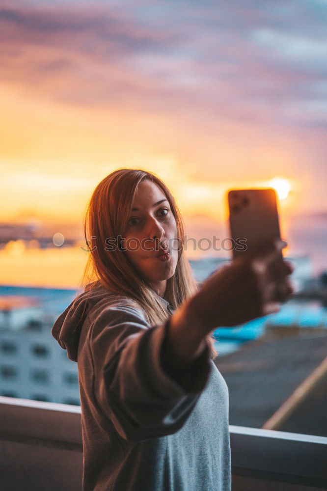 Similar – Young woman posing on stairs on street