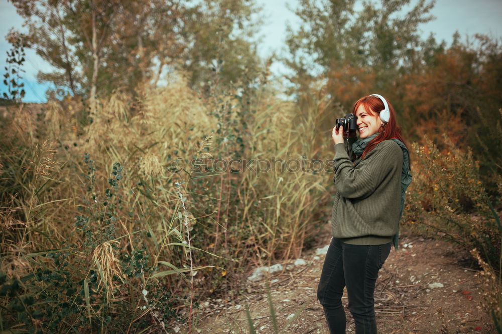 Similar – Young redhead woman outdoors in nature