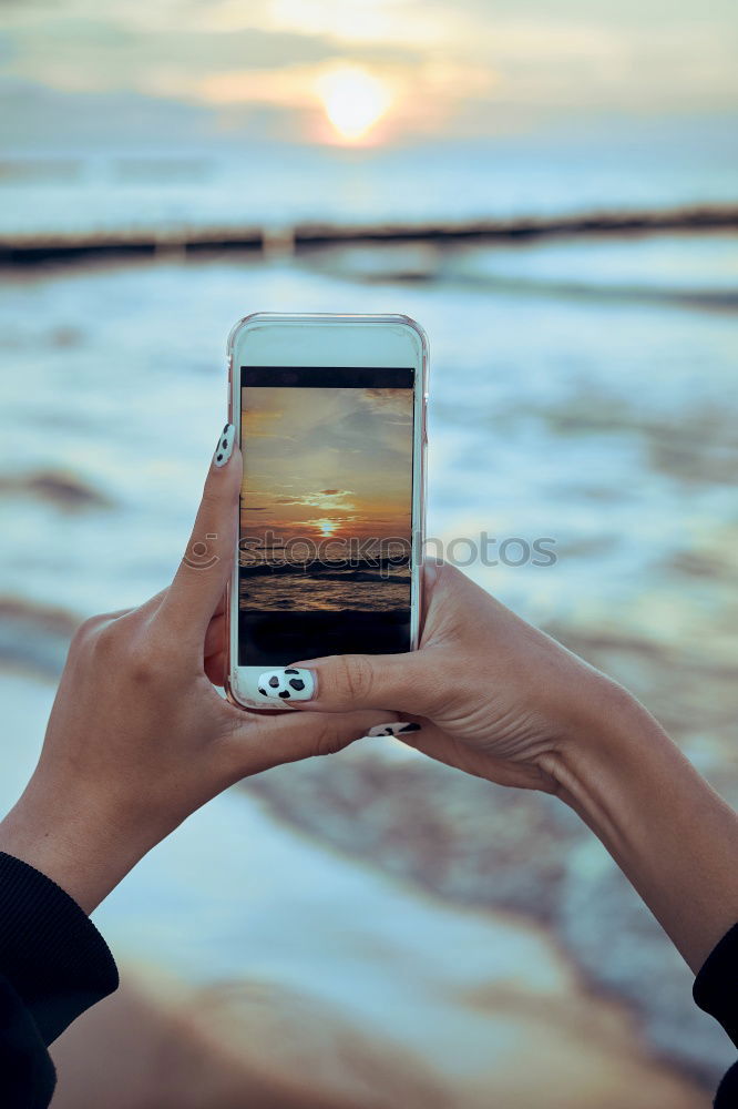 Similar – Image, Stock Photo Happy young woman with tablet PC on beach at sunset. Evening sun, sea and beach on background