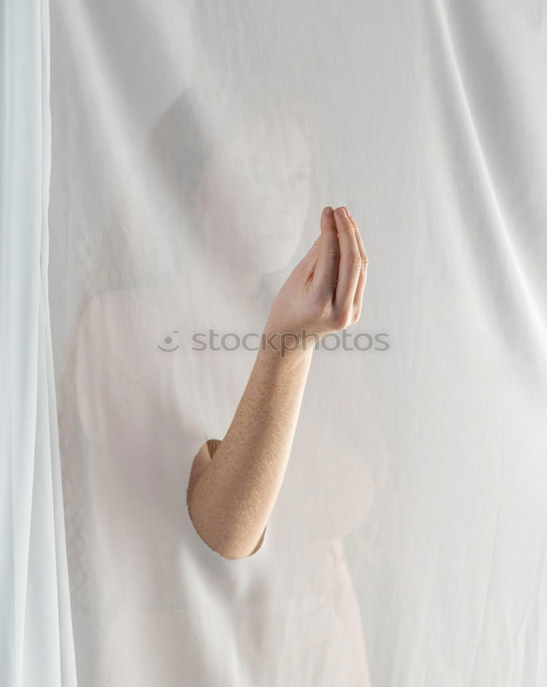 Similar – Woman tosses her hair back. Face parallel to the ceiling. Look up. Brown hair