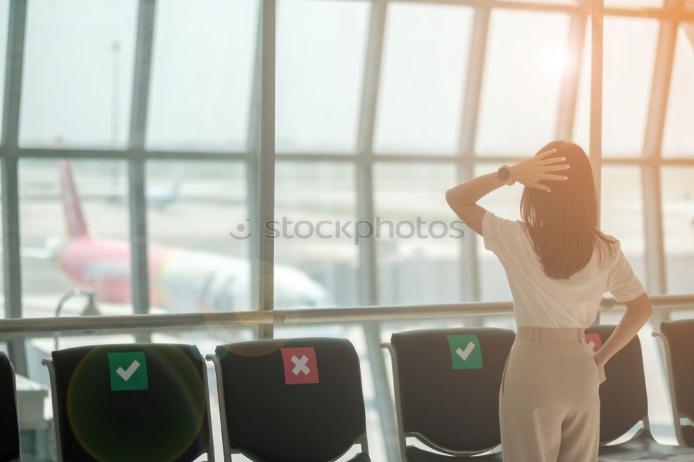 Similar – Image, Stock Photo Black Woman looking at the timetable information panel in the airport with a suitcase