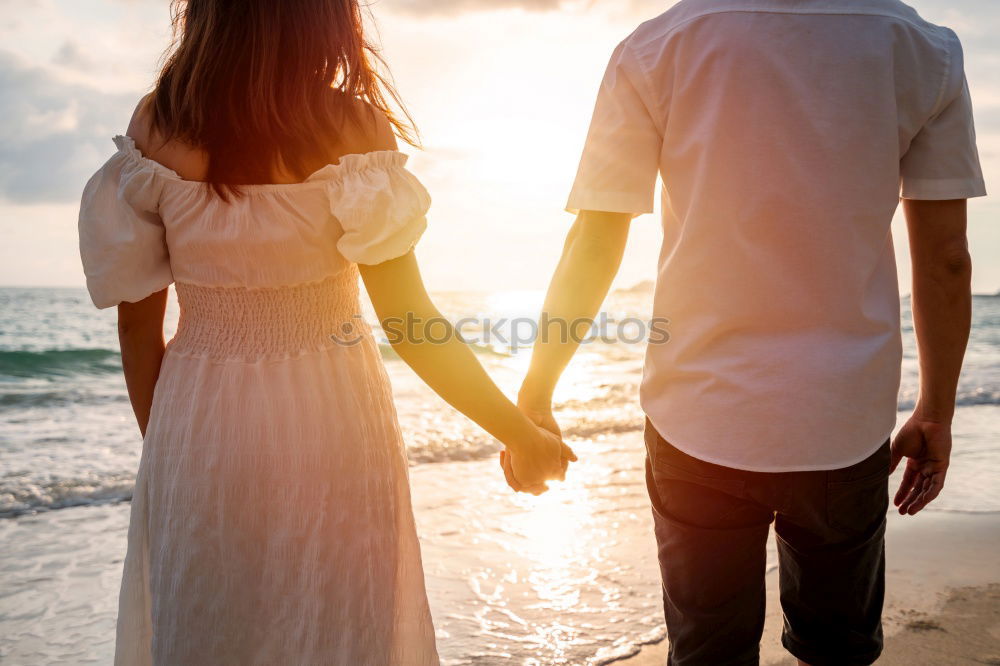 Similar – Two little kids holding her hands on a summer day