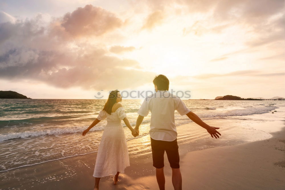 Similar – Father and son playing on the beach at the sunset time. Concept of friendly family.