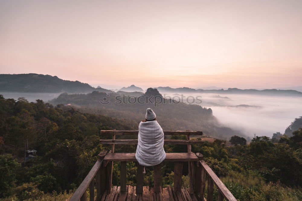 Similar – Man admiring view on cliff