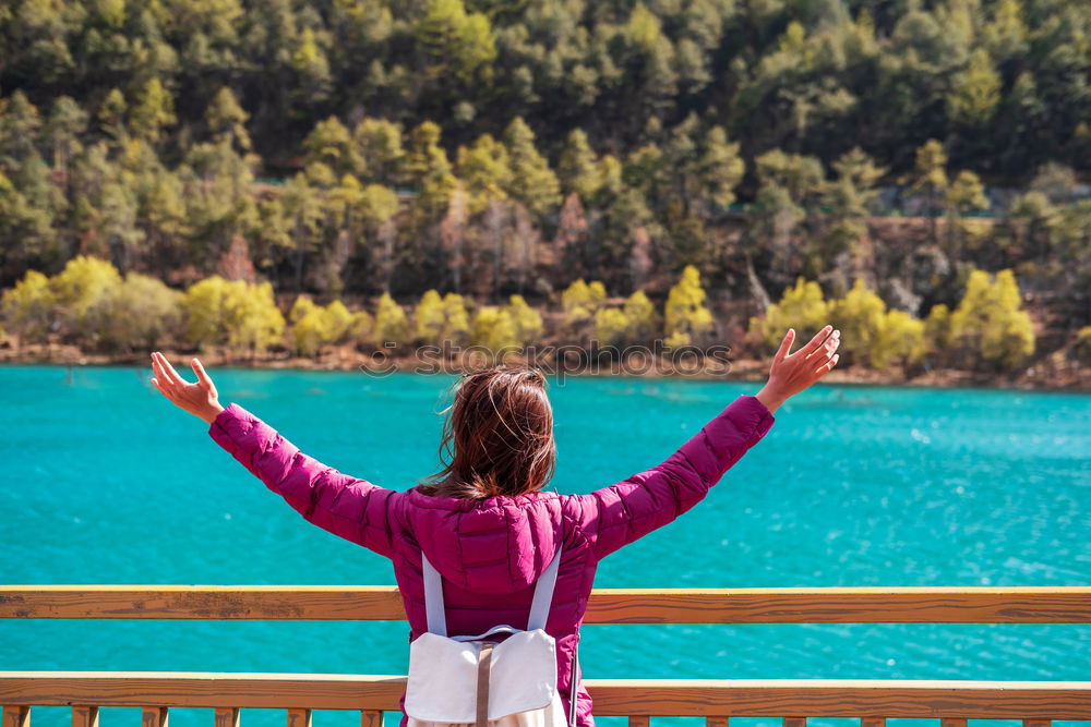 Similar – Stylish woman on picturesque landscape