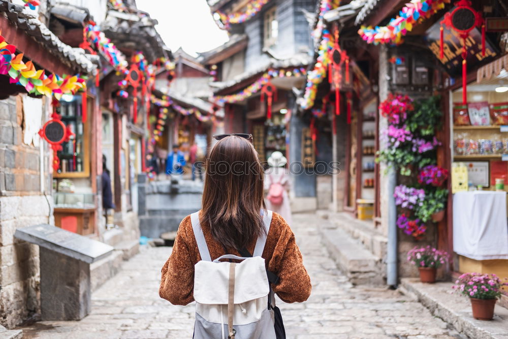 Similar – Image, Stock Photo Young woman standing under Chinatown neighbourhood arch in Sydney city, Australia.