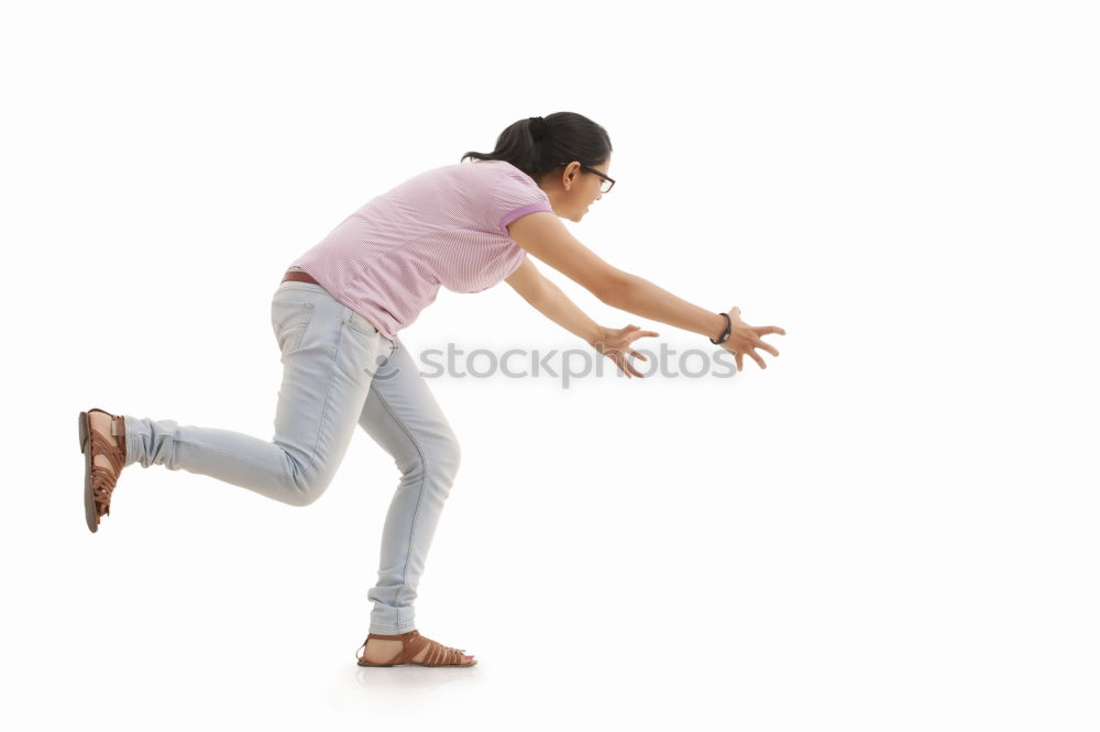 American man jumping in the park.