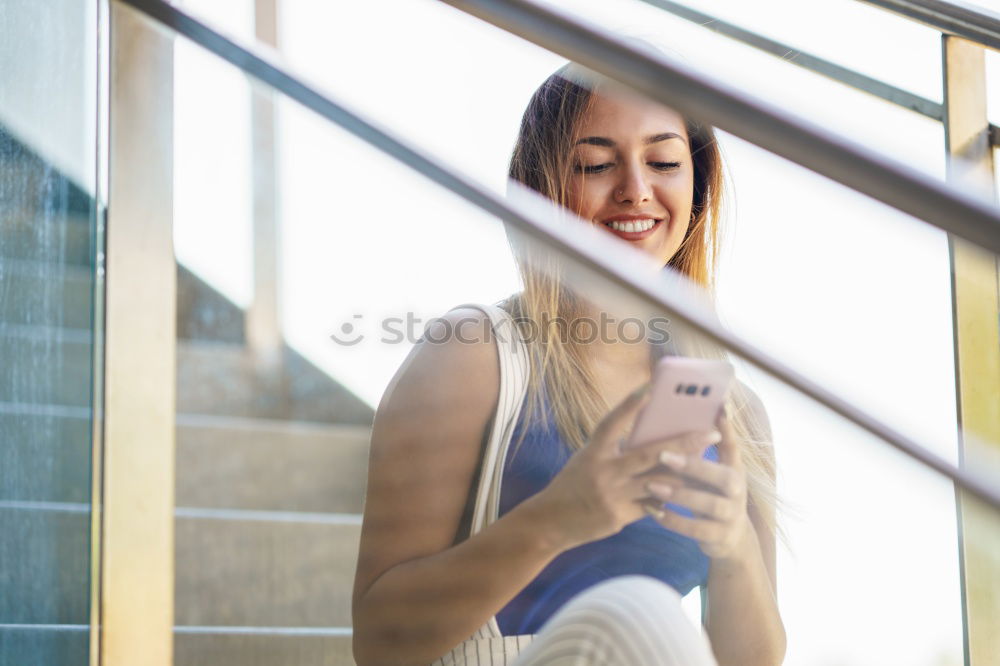 Similar – Young thoughtful woman looking through the window