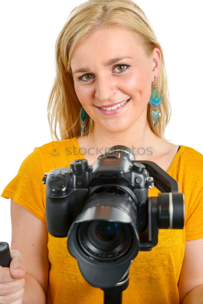 Similar – Young woman taking pictures with an instant camera