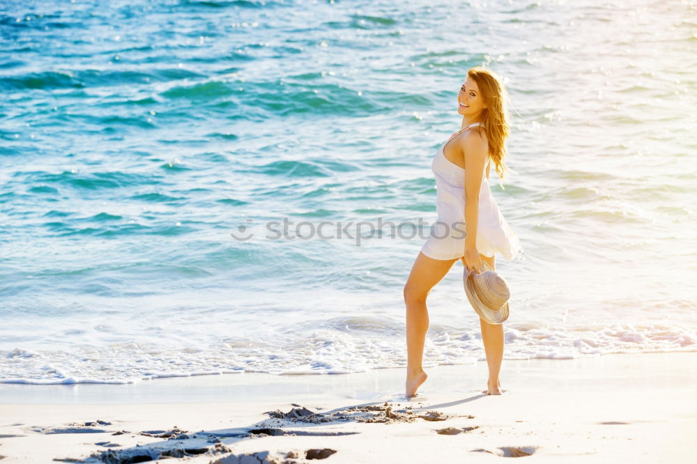 Image, Stock Photo Group of younf adult friends walking on the beach