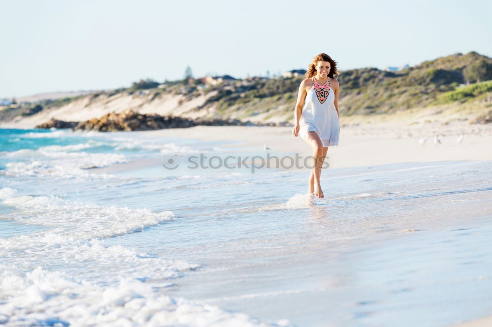 Similar – Image, Stock Photo caucasian mother and sun are walking into the water at the beach