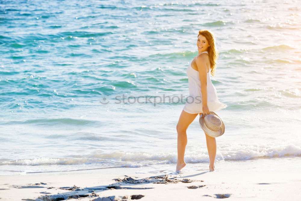 Similar – Image, Stock Photo Group of younf adult friends walking on the beach