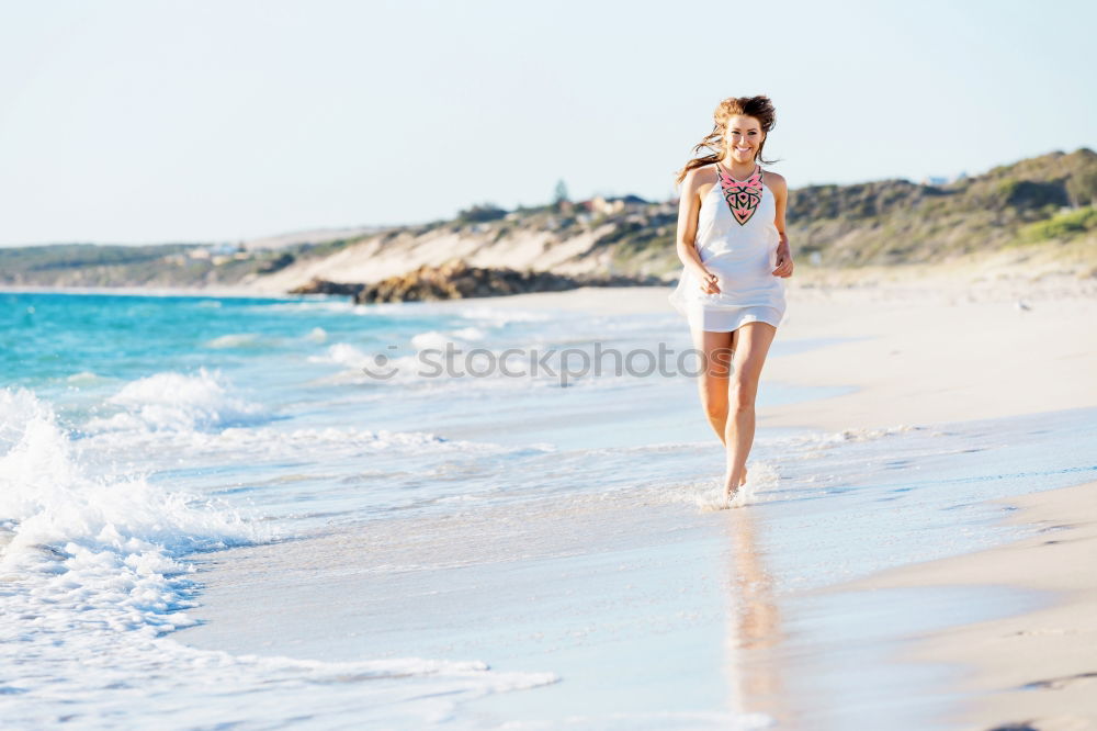 Similar – Image, Stock Photo caucasian mother and sun are walking into the water at the beach