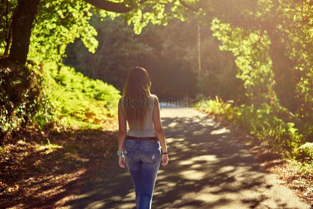 Similar – Image, Stock Photo Adult woman is walking in the forest