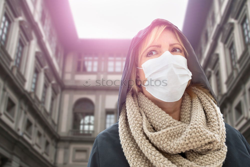 Similar – close up of Photo of a woman wearing protective mask against infectious diseases, coronavirus, covid-19 and flu outdoors. copy space. Coronavirus outbreak in Europe. Flu epidemic spread prevention