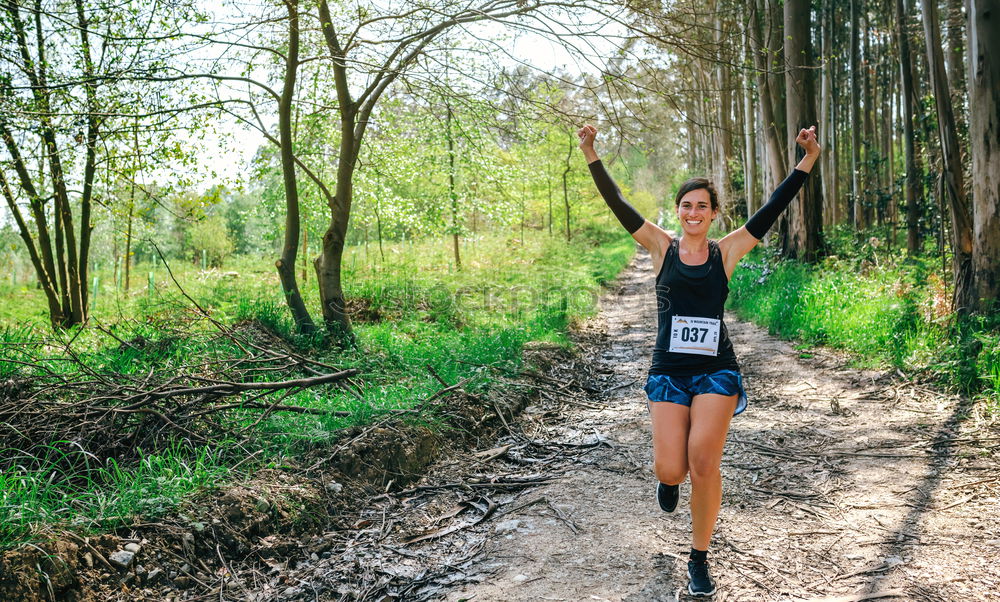 Similar – Image, Stock Photo Fit muscular man jogging on a rural trail
