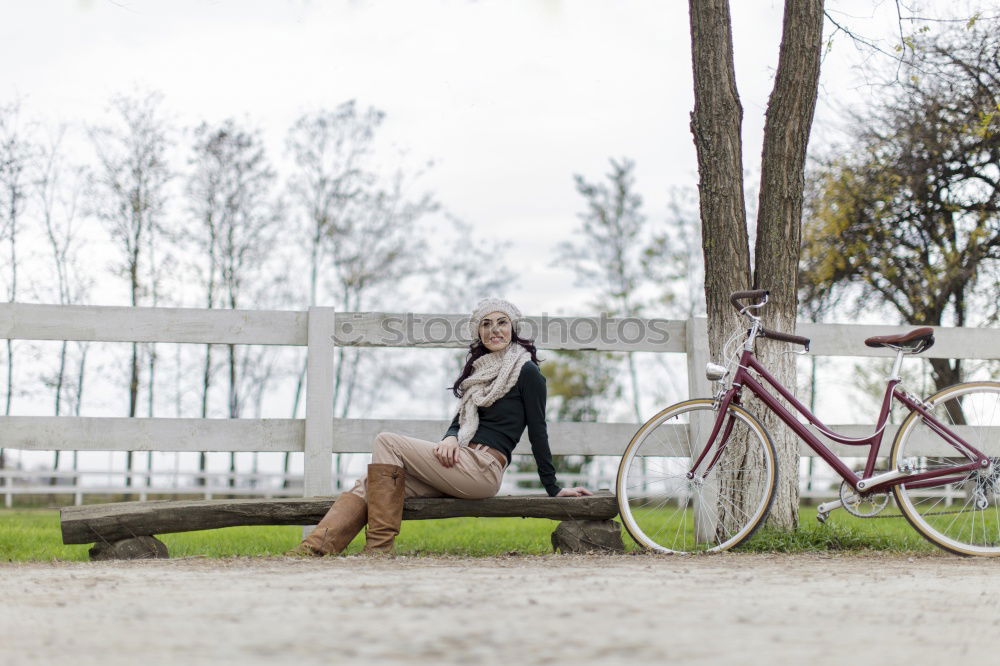 Similar – Image, Stock Photo Black young woman riding a vintage bicycle