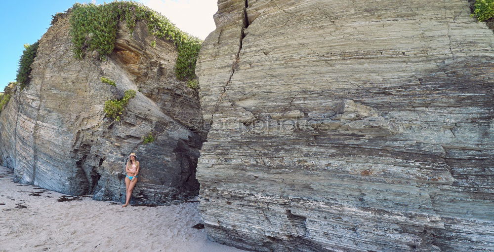 Similar – Image, Stock Photo Young woman over a cliff in a celtic ruins in Galicia