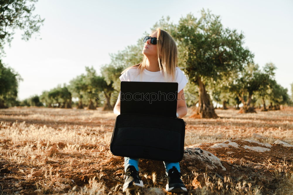 Similar – Image, Stock Photo Young woman walking in a path in the middle of a vineyard