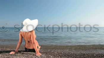 Similar – Girl Lying Down on a Bench at San Francisco, California