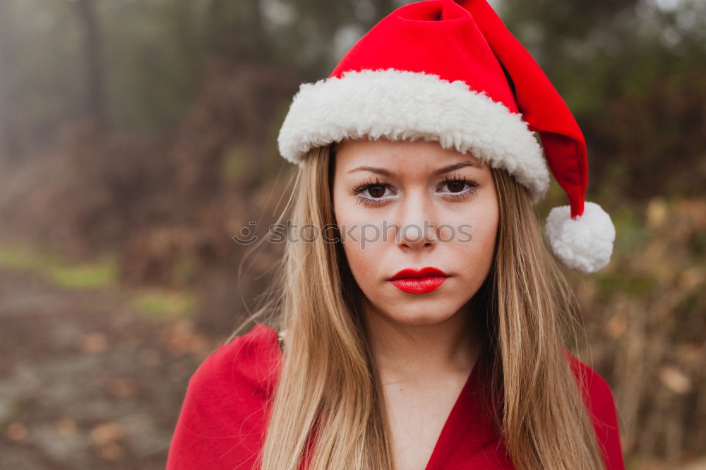 Similar – Image, Stock Photo Young woman with Christmas hat in the forest