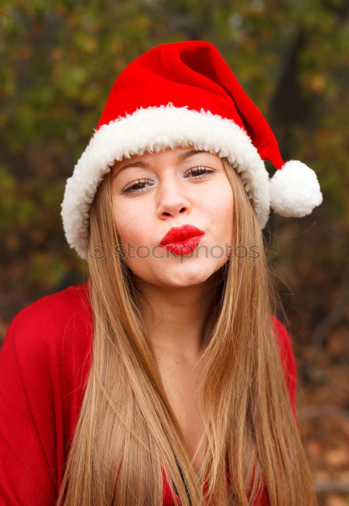 Similar – Brunette woman with red deer wool sweater