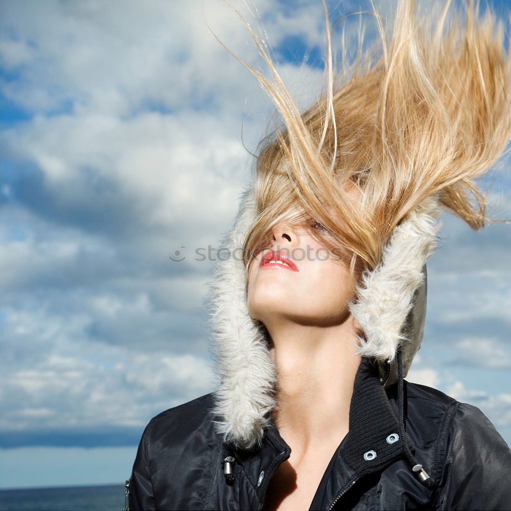 Similar – Woman with blown away hair