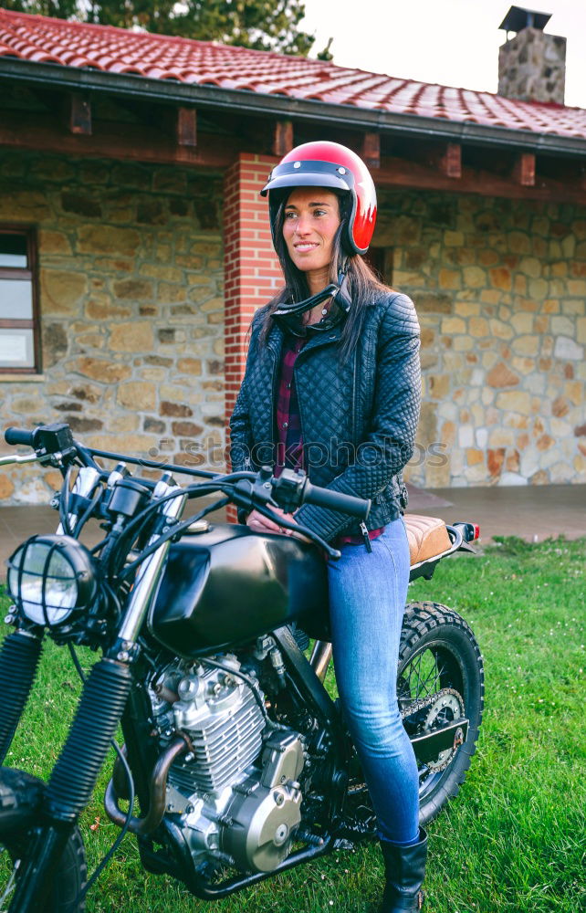 Similar – Woman with helmet riding custom motorbike