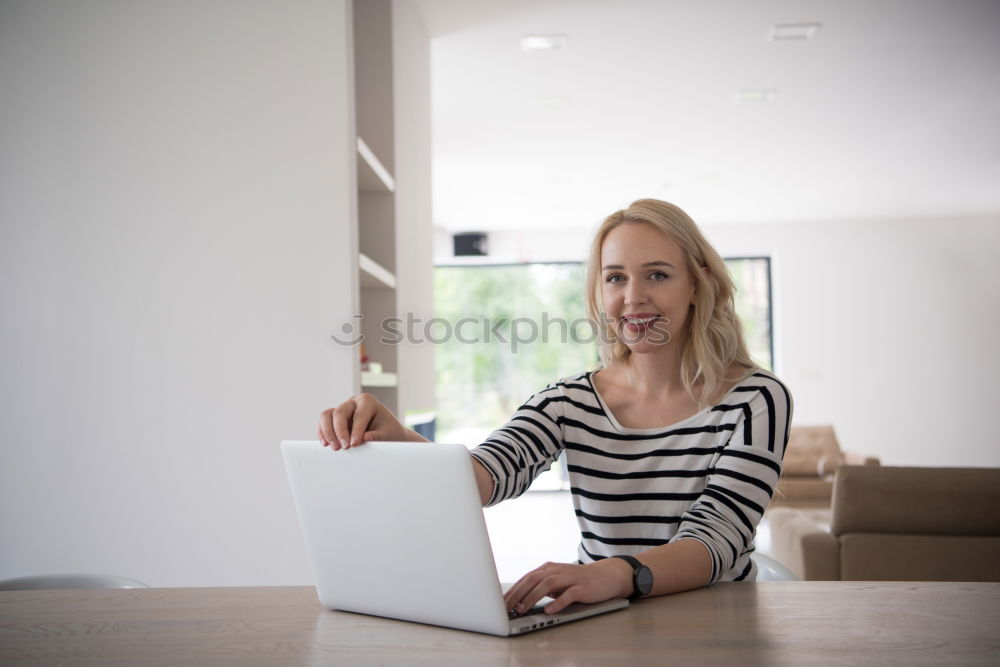 Similar – Young beautiful blonde woman on the computer working