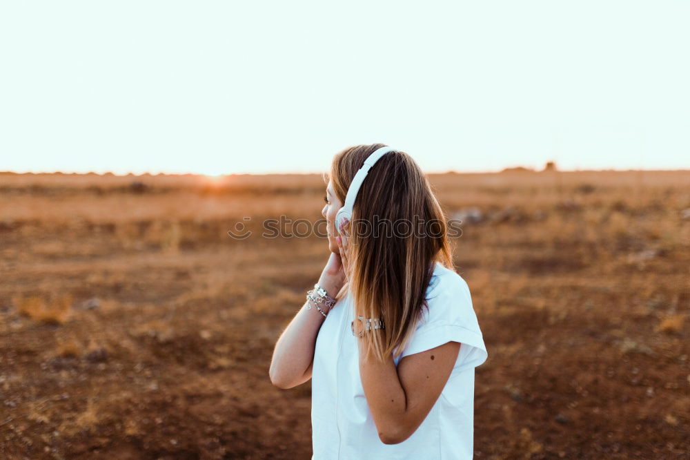 Similar – Mother walking with daughter through the fields