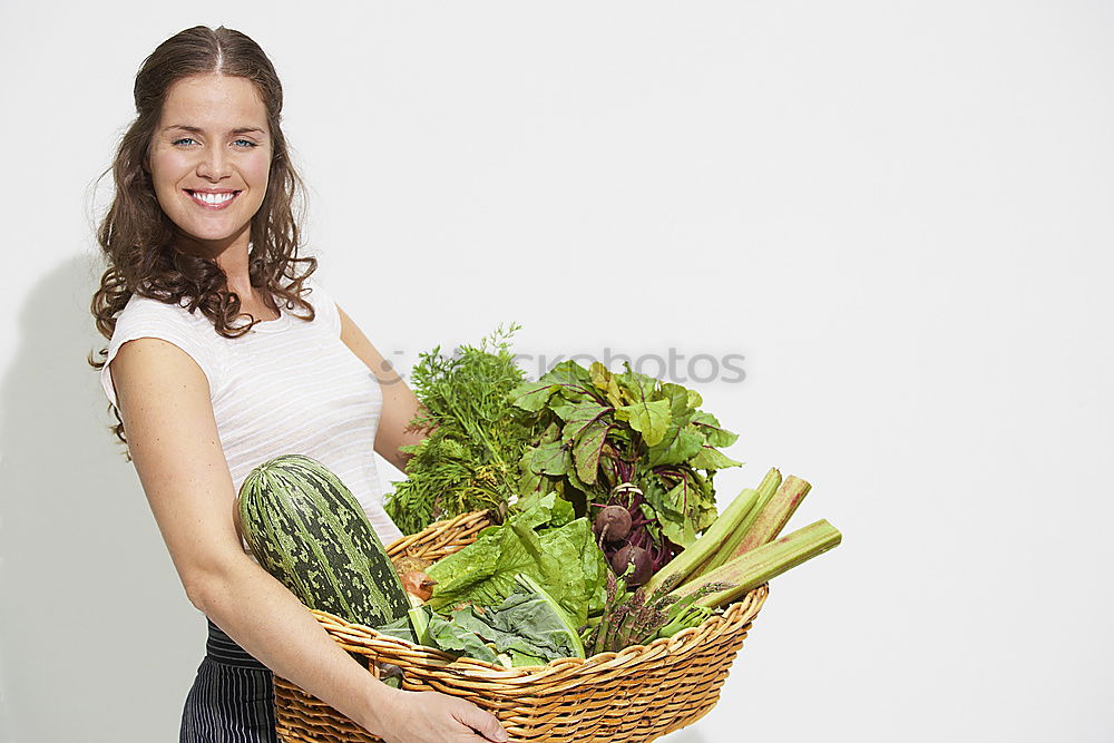 Similar – Image, Stock Photo Vegan girl holding a bunch of swiss cahrd