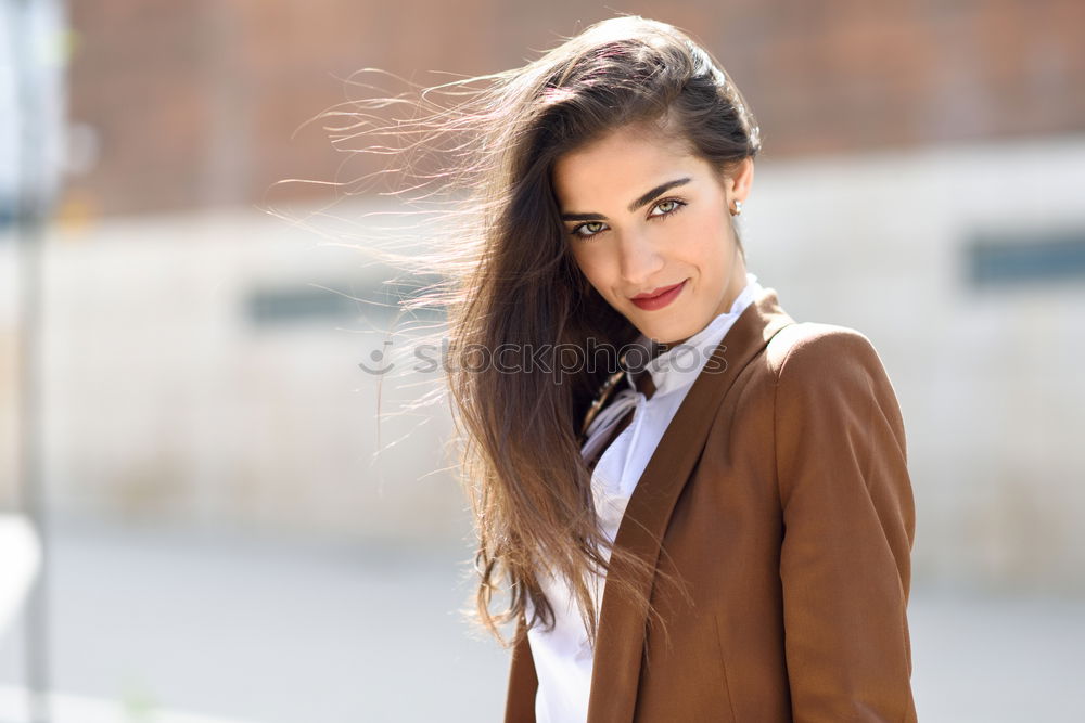 Similar – Image, Stock Photo Beautiful young businesswoman looking at camera.