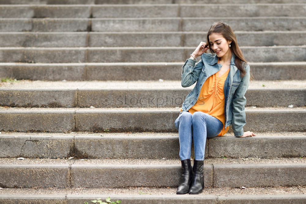 Similar – Image, Stock Photo Young woman sitting reading on urban steps