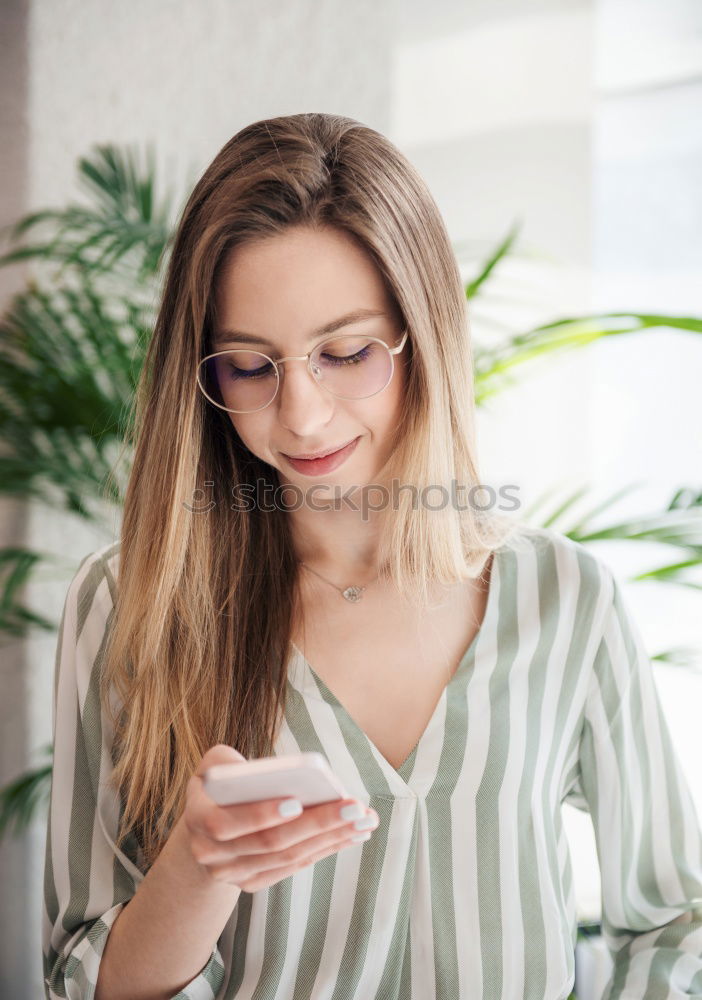 Similar – Image, Stock Photo Asian young woman texting message with phone