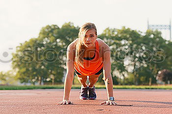 Image, Stock Photo Young Woman working out outdoors and having fun