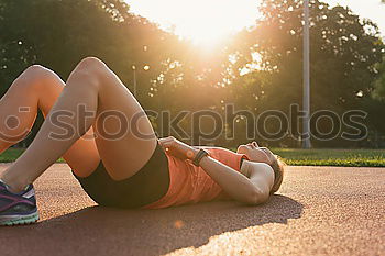 Similar – Happy fit young woman doing stretching exercises