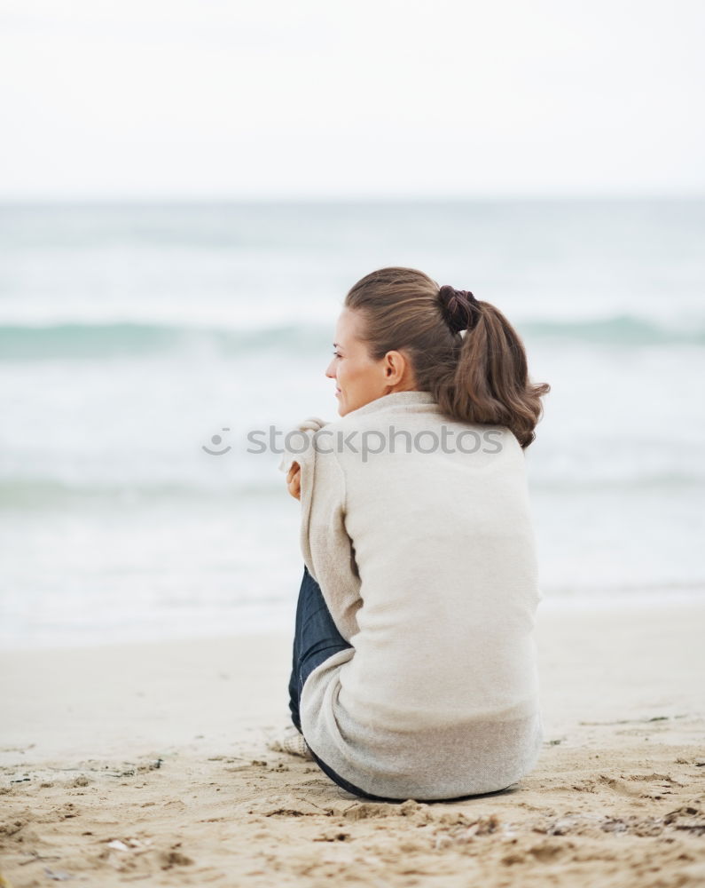 Similar – Brothers sitting at waterfront.Back view