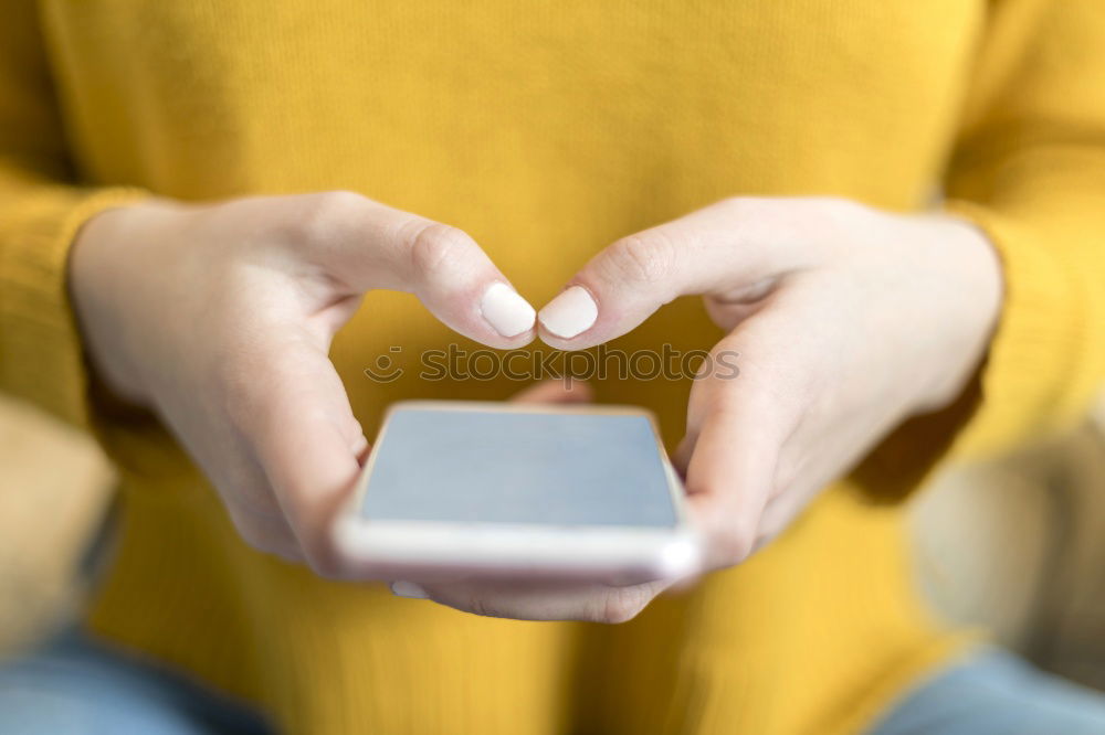 Similar – Closeup of woman’s hands using a smartphone