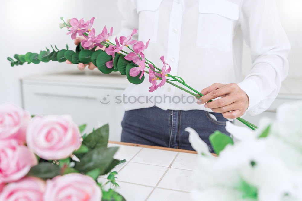 Similar – Image, Stock Photo Female hands with bouquet and vase