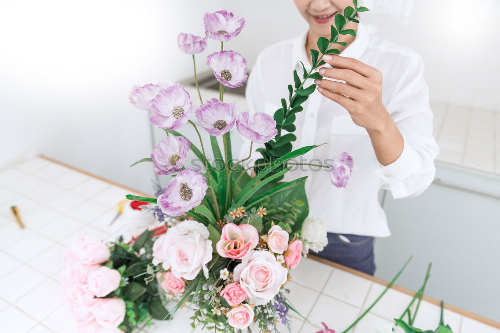 Similar – Image, Stock Photo Young man with bunch of flowers in hands