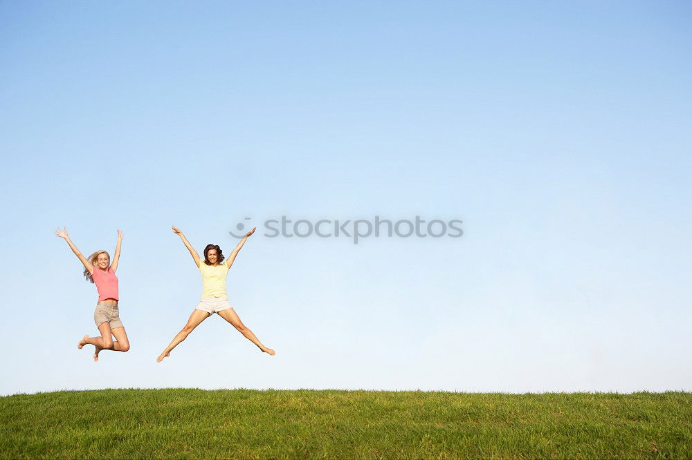 Similar – Women posing in sandy hills