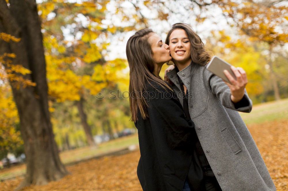 Similar – Image, Stock Photo Two girls sitting on bench in the park background