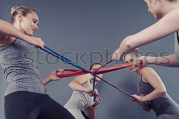 Similar – Image, Stock Photo People doing stretch exercises in fitness class