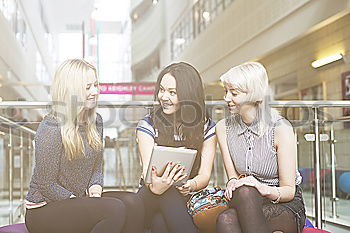 Similar – Image, Stock Photo Atttractive young women waiting for train