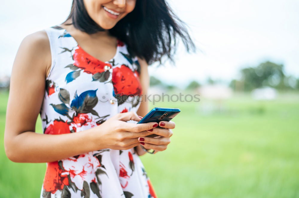 Similar – Image, Stock Photo Young Arab woman texting with her smart phone