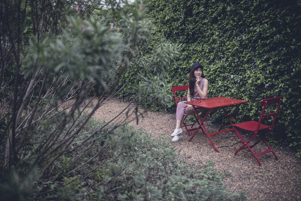 Similar – A Young Woman Standing in the Woods