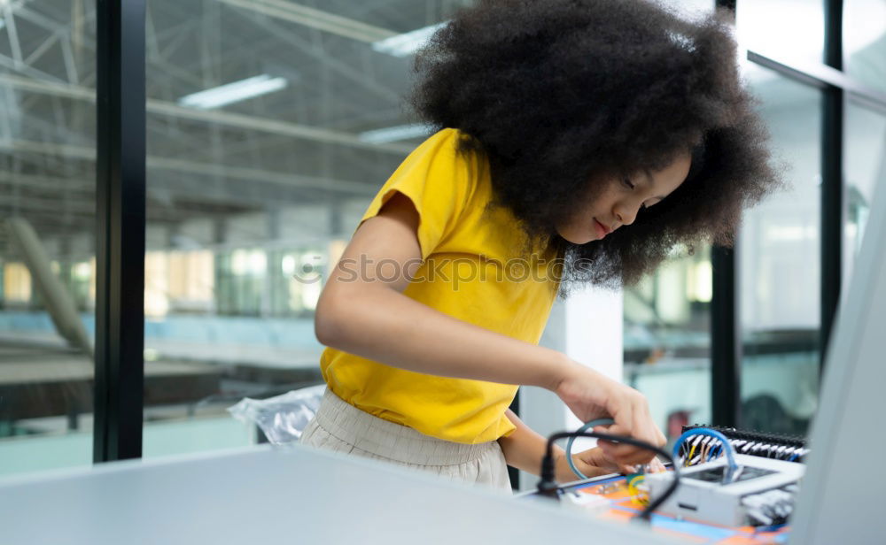Similar – Image, Stock Photo Woman with afro hair jumping down a slide.