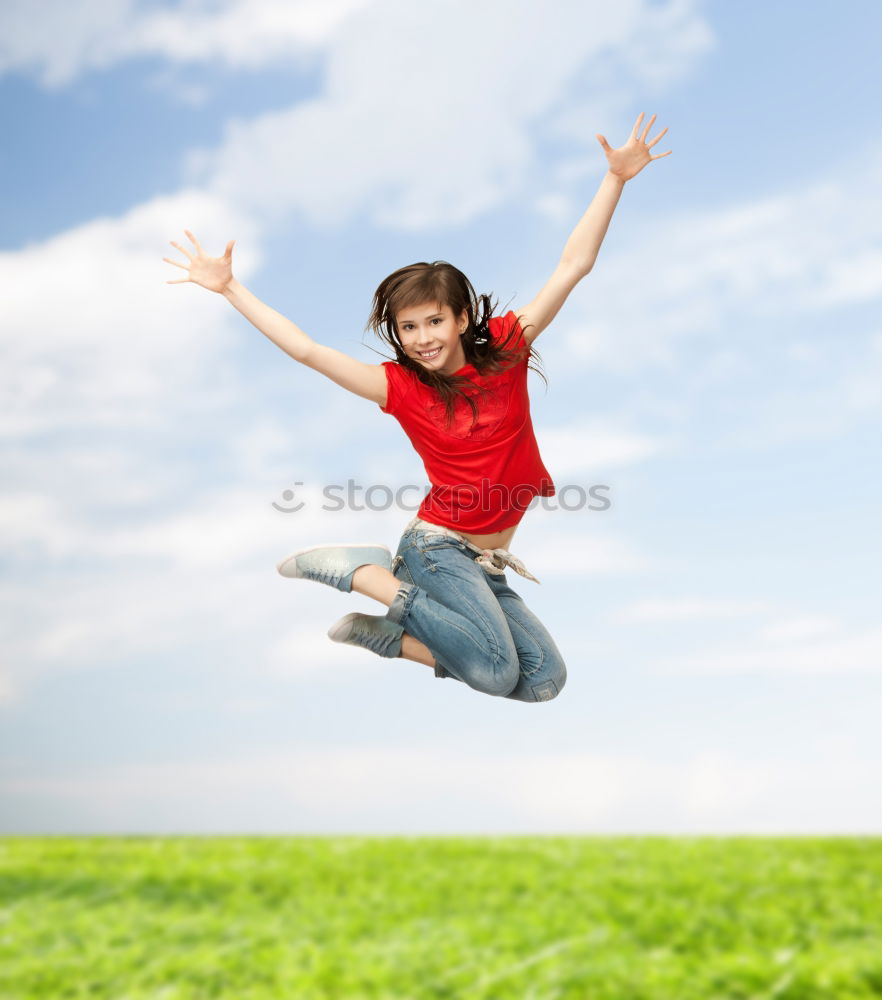 Similar – Low view of a happy redhead woman outdoors