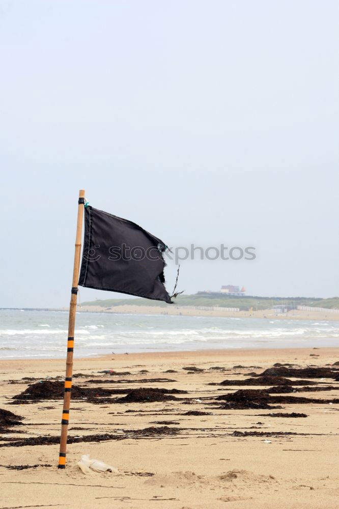 Similar – no swimming Flag Beach