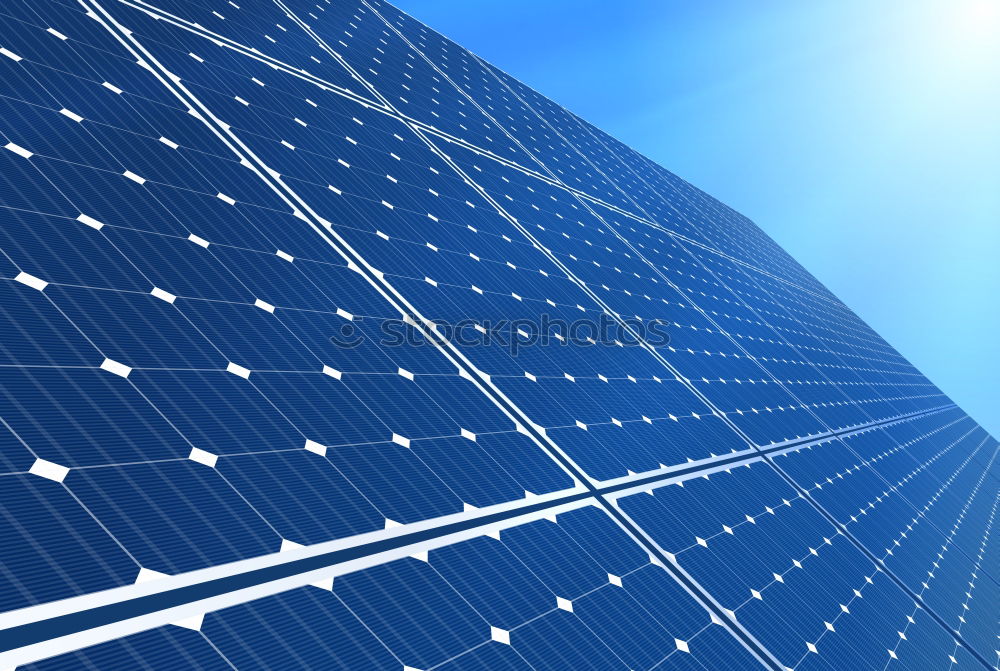 Similar – Photovoltaic panels in a solar power plant over a blue sky.